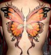 butterfly girl's back tattoo